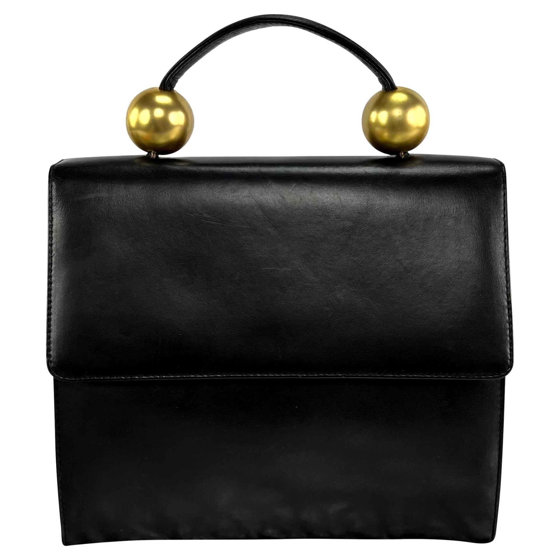 1980s Donna Karan Gold Bauble Black Leather Top Handle Crossbody Bag